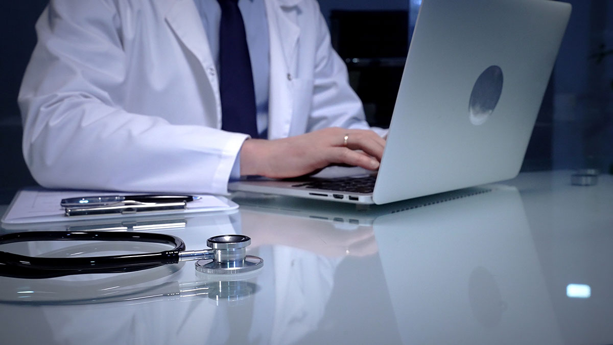 doctor using laptop